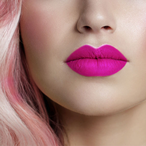 Woman with barbie inspired pink hair and lipstick 