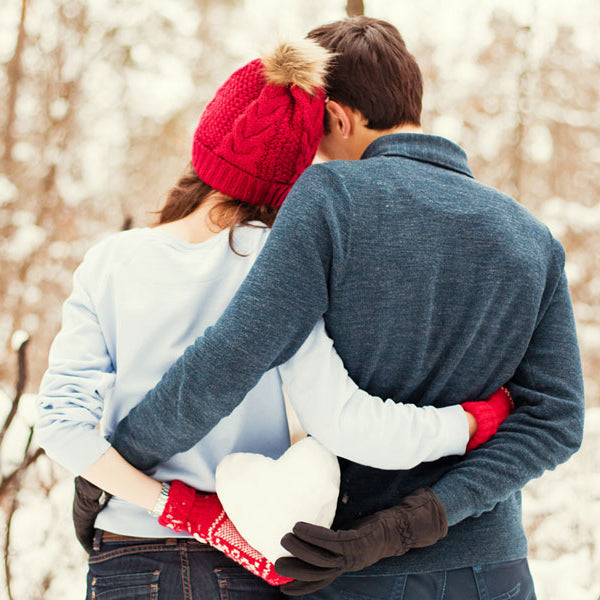 young man and woman in snow, holding heart, college crush erotic story