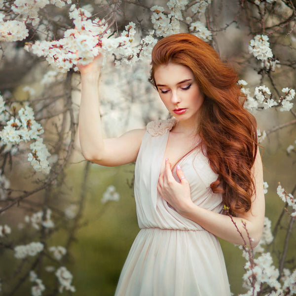 red hair, woman, flowering trees, raven haired virgin story