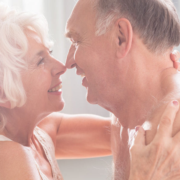 Elderly couple embracing, senior sex story