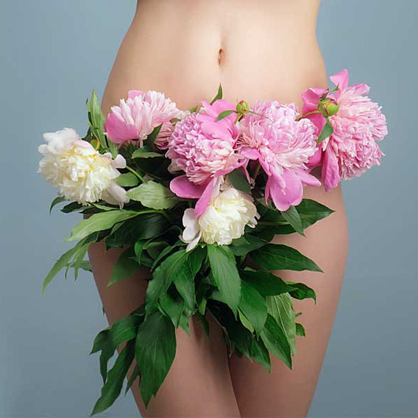 Woman hips, flowers, How To Shave Pubic Hair