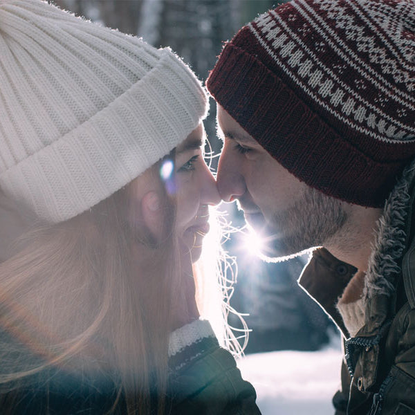 man and woman kissing in snow, erotic story, ski lodge vacation
