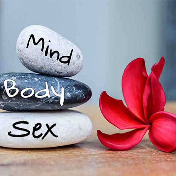 Stones labeled mind, body, sex, Holistic Health & Sex