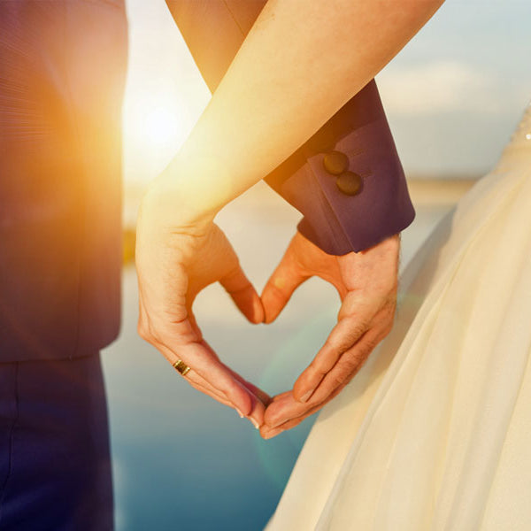 husband and wife making heart with hands, soulmates, true erotic story