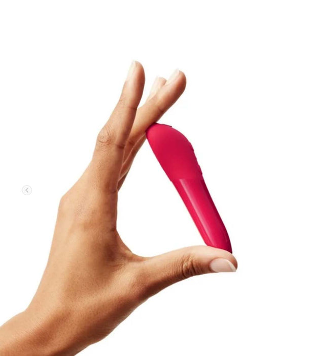Coral We-Vibe Tango X Bullet Vibrator In Hand